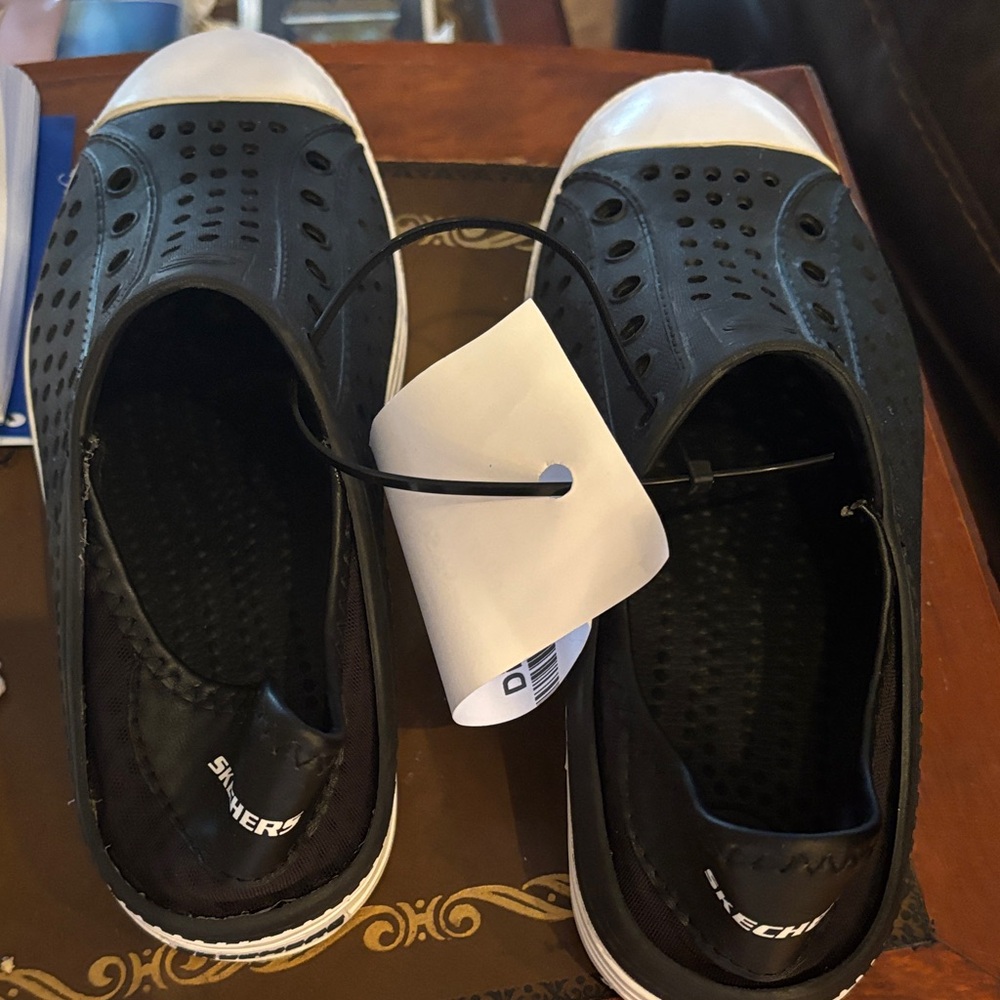 Skechers Kids Black Slip-On Sneakers with White Toe Cap